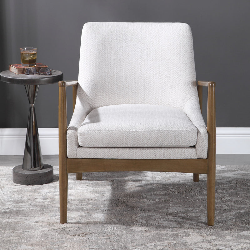 Uttermost Bev white accent arm chair with plush upholstery and sleek wooden legs, stylish and comfortable for modern living spaces.