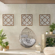 Noble House Morris Teardrop hanging chair with chain and water-resistant cushions, ideal for outdoor relaxation.