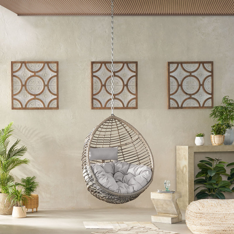 Noble House Morris Teardrop hanging chair with chain and water-resistant cushions, ideal for outdoor relaxation.
