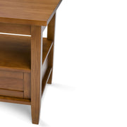 Handcrafted Warm Shaker coffee table by Simpli-Home with a wooden finish and sturdy design, shown in a living room setting.