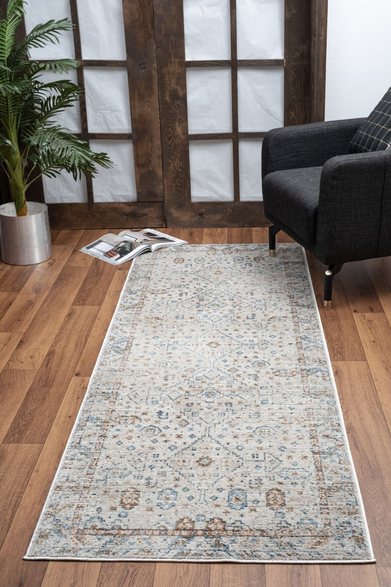 Noble - 5'3" X 7'3" Polyester Area Rug - Ivory - R&R Furniture Gallery (Fountain Valley, CA)