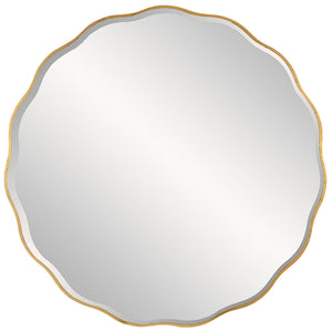 Uttermost Aneta round wall mirror with a sleek frame hanging on a wall, showcasing modern home decor style.