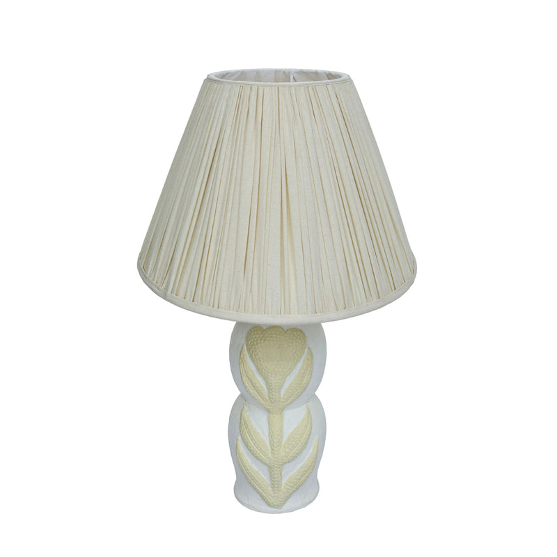 Cream Edith curved papier mache flower pleated table lamp by TOV Furniture, showcasing its unique floral design and textured surface.