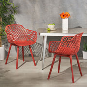 Set of two Noble House Poppy chairs with cushioned seats and wooden legs, featuring a modern design for dining or living spaces.