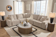 Benchcraft Carceri reclining sectional with plush fabric, featuring multiple seating areas and built-in recliners for comfort.