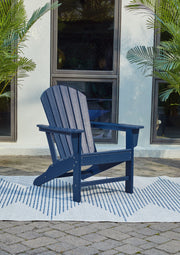 Outdoor conversation set with two cushioned chairs and a matching table, part of the Sundown Treasure 3-piece outdoor set by Signature Design.