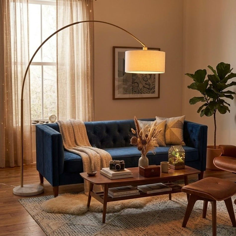 Ambient Arch Floor Lamp by Ashcroft Furniture with large linen shade and gold brass arc design, 84-inch tall for living room lighting.