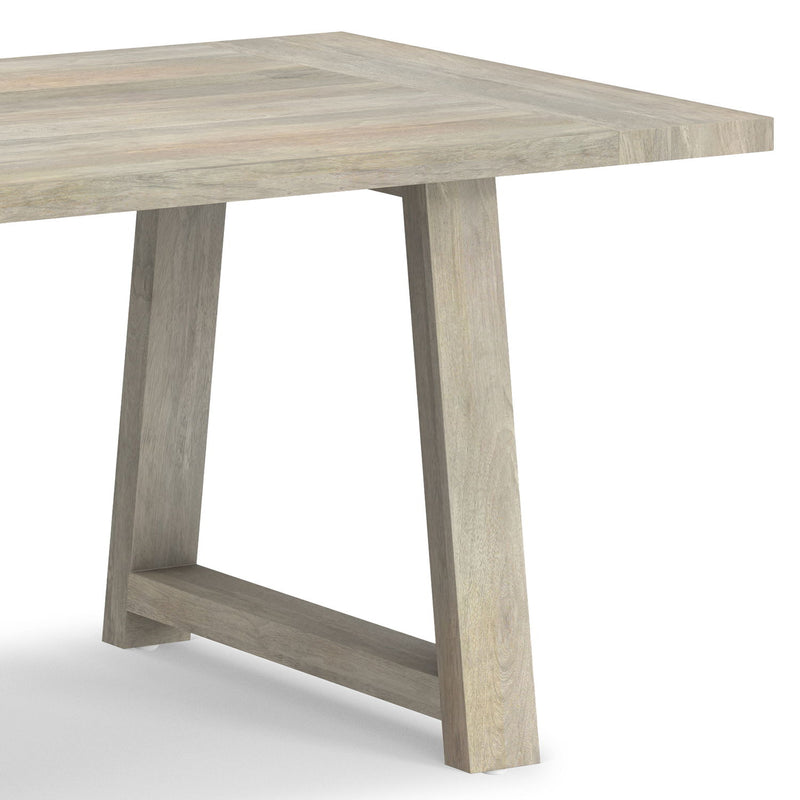 Simpli-Home Whitley dining table with wooden surface and sturdy legs, ideal for kitchen or dining room settings.