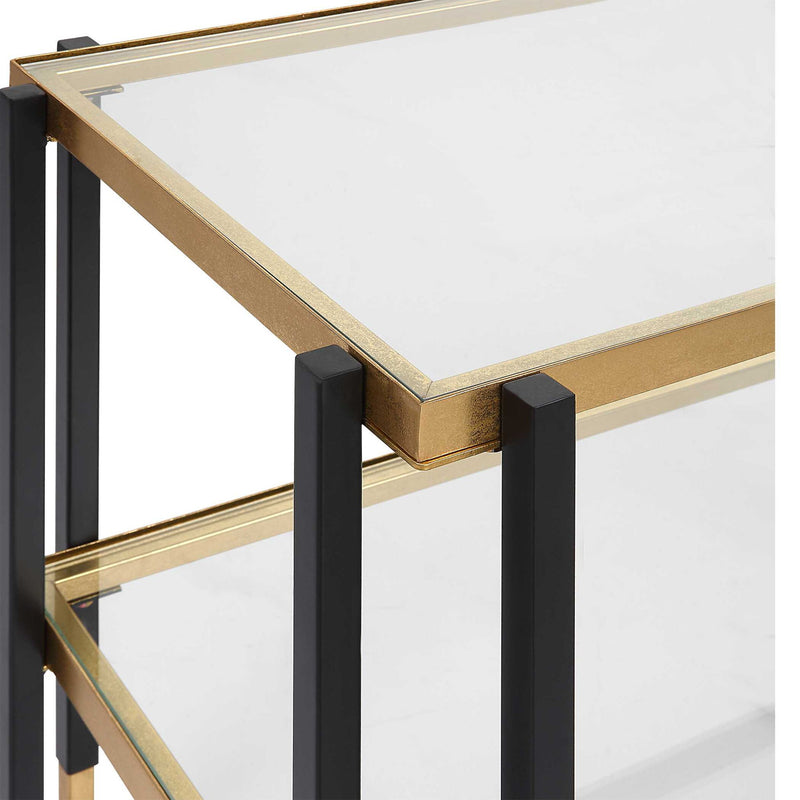 Uttermost Kentmore glass console table with sleek metal frame and clear tempered glass top, modern and stylish for entryways or living rooms.