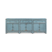 Classic Home Winford 3-drawer, 6-door buffet cabinet showing wooden finish and spacious storage compartments.