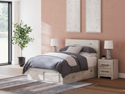 Signature Design by Ashley Lawroy panel storage bed with built-in drawers and modern wood finish, showcasing a stylish bedroom furniture piece.