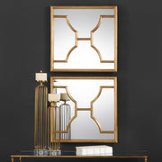 Pair of Uttermost Misa square wall mirrors with gold frames, stylish modern decor for living or bedroom walls.