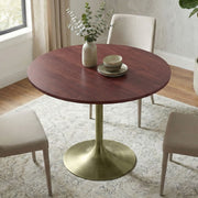 Walnut Radford round dining table by Simpli-Home, showcasing a smooth wooden surface and sturdy base for modern dining rooms.