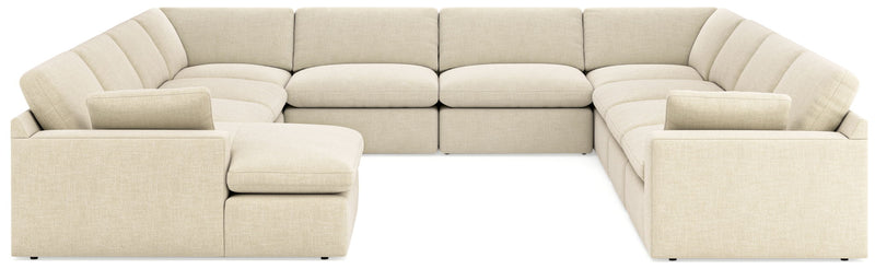Benchcraft Elyza stationary sectional sofa with plush cushions and modern design, shown in a contemporary living room setting.