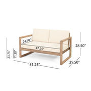 Noble House 4-piece acacia wood outdoor patio furniture set with coffee table, deep seating porch chairs and beige cushions.