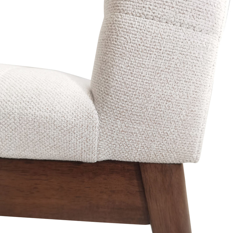Set of two Noble House upholstered dining chairs with beige fabric and black rubber legs, modern and comfortable for dining rooms.