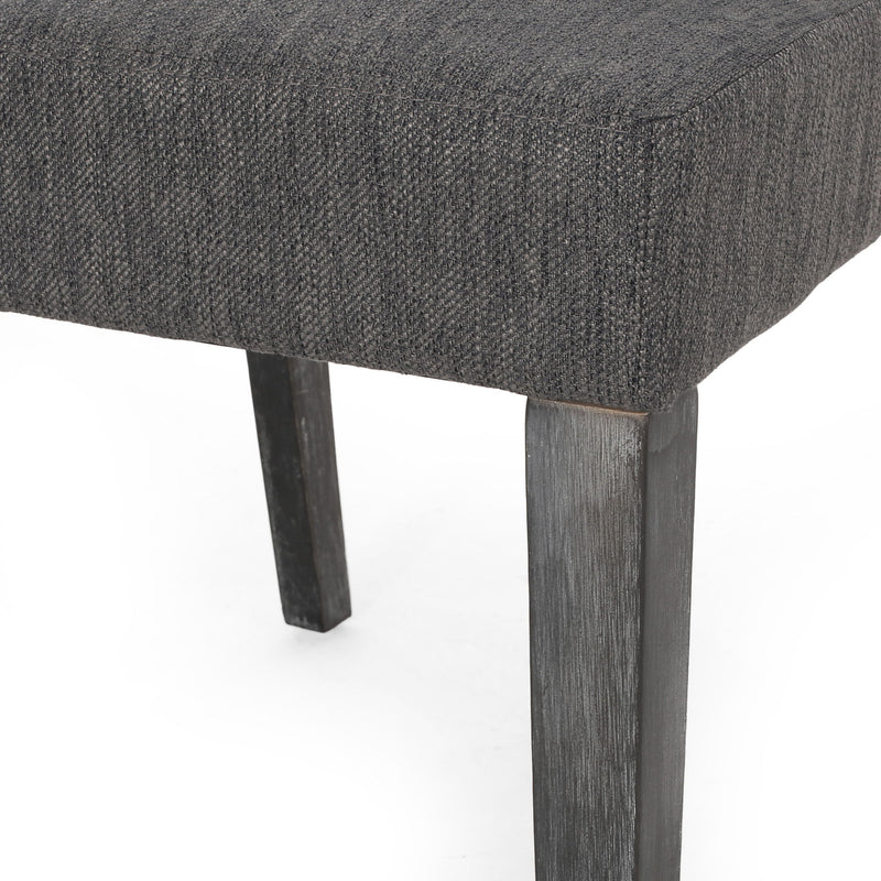 Contemporary Noble House dining chair with upholstered seat and tapered wooden legs, set of chairs for modern dining room.