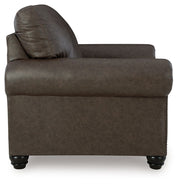 Benchcraft Roxmere living room set with stationary chair and ottoman, featuring plush upholstery and modern design.