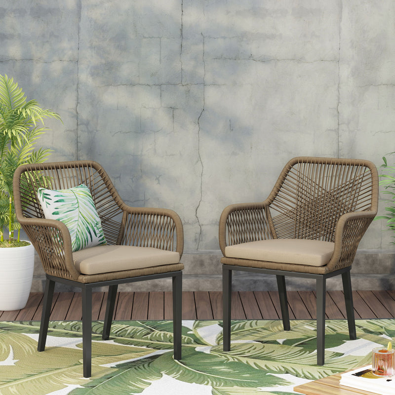 Modern wicker arm chair by Noble House with water-resistant cushions in brown and beige, ideal for stylish outdoor or indoor dining spaces.