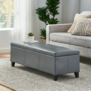 Contemporary Noble House Glouster storage ottoman with cushioned top and wooden legs, ideal for living room storage and seating.