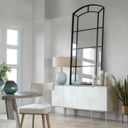 Black oversized arch mirror by Uttermost, accent mirror with a bold, contemporary design and a sleek black finish.