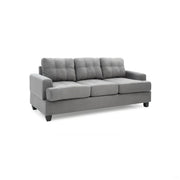 Glory Furniture Sandridge stationary sofa with beige upholstery, plush cushions, and wooden legs in a modern living room setting.