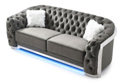 Glory Furniture Sapphire stationary sofa with plush blue upholstery and modern design, featuring wide armrests and cushioning.
