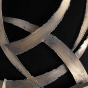 Set of two black metal wall art pieces featuring abstract brushstroke designs by Uttermost for modern home decor.