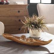 Light brown teak leaf-shaped bowl from Uttermost, ideal for serving or decorative use in plates and bowls collection.