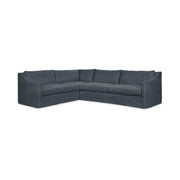 Classic Home Kipton upholstered corner sectional with plush cushions and modern design, shown as a stationary sectional in a living room.