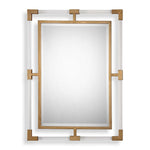 Uttermost Balkan iron wall mirror with round, distressed metal frame, hanging on a neutral-colored wall.