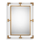 Uttermost Balkan iron wall mirror with round, distressed metal frame, hanging on a neutral-colored wall.