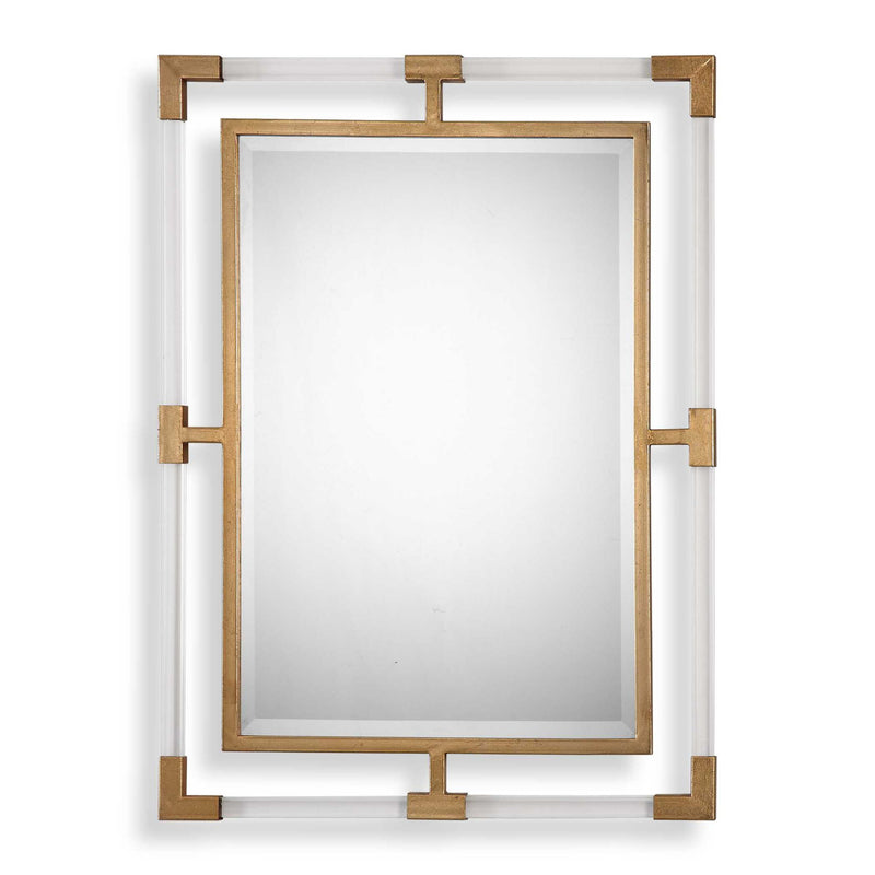 Uttermost Balkan iron wall mirror with round, distressed metal frame, hanging on a neutral-colored wall.