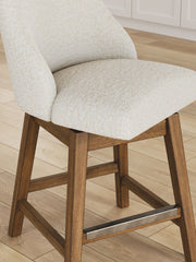 Cabalynn - Upholstered Swivel Barstool (Set of 2) - Oatmeal / Light Brown - R&R Furniture Gallery (Fountain Valley, CA)