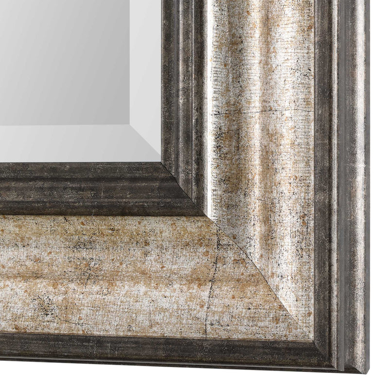 Uttermost Shefford wall mirror in antiqued silver finish with a stylish, textured frame for elegant home decor.