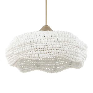 White Biddeford 5-light beaded pendant light by Uttermost hanging from a ceiling, showcasing intricate bead design and elegant lighting.