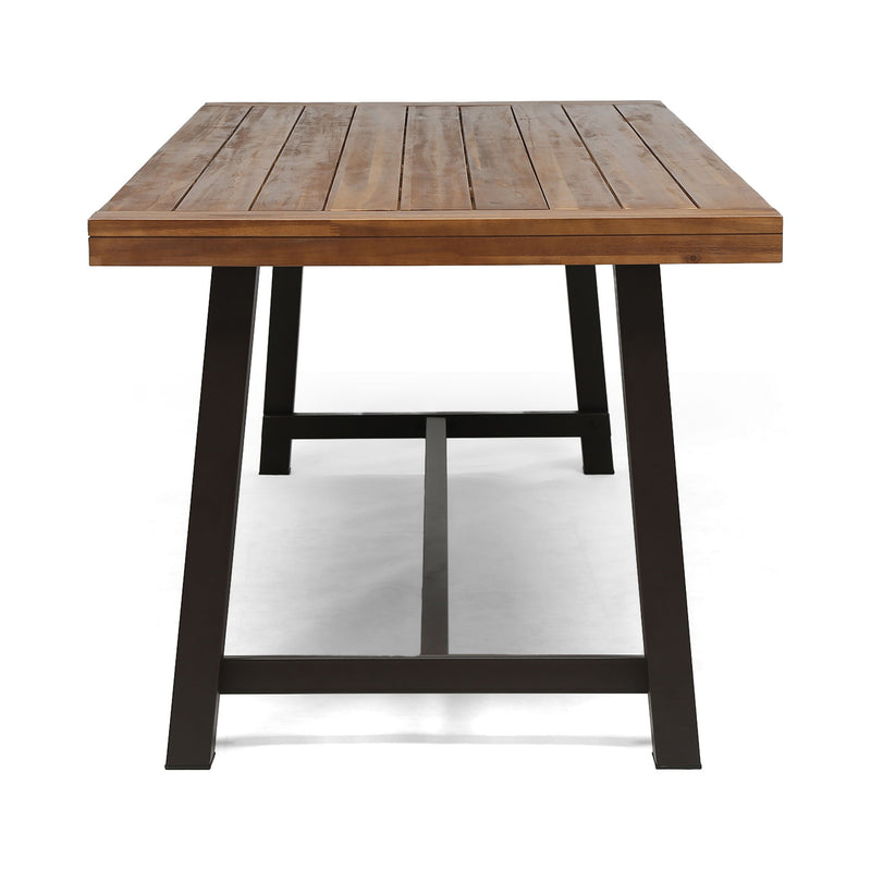 Noble House Equilibrium outdoor dining table with wooden frame and slat top, suitable for patio or garden dining spaces.