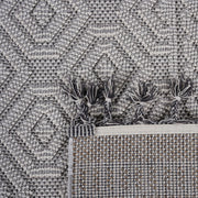 Guros - 6' X 9' Geometric Indoor / Outdoor Area Rug - White - R&R Furniture Gallery (Fountain Valley, CA)