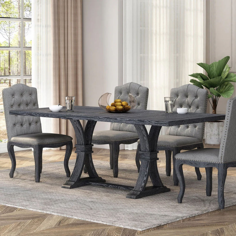 Rustic gray extendable dining table by Noble House, featuring a sturdy design with extension leaves for flexible seating.