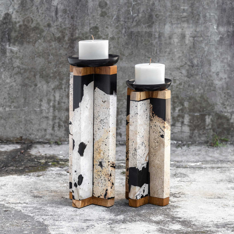 Pair of black and white stone candleholders from Uttermost, designed as decorative candle holders in a modern style.