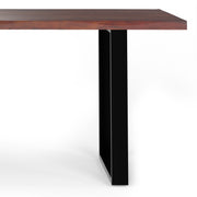 Handcrafted dining table from Simpli-Home's Fieldcrest collection, featuring a solid wood surface and sturdy legs.