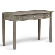 Handcrafted Warm Shaker desk by Simpli-Home featuring a natural wood finish and sleek design for writing and workspace.