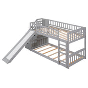 Gray DreamHaus twin over twin bunk bed with stairway, built-in slide, and two storage drawers, ideal for kids' bedrooms.