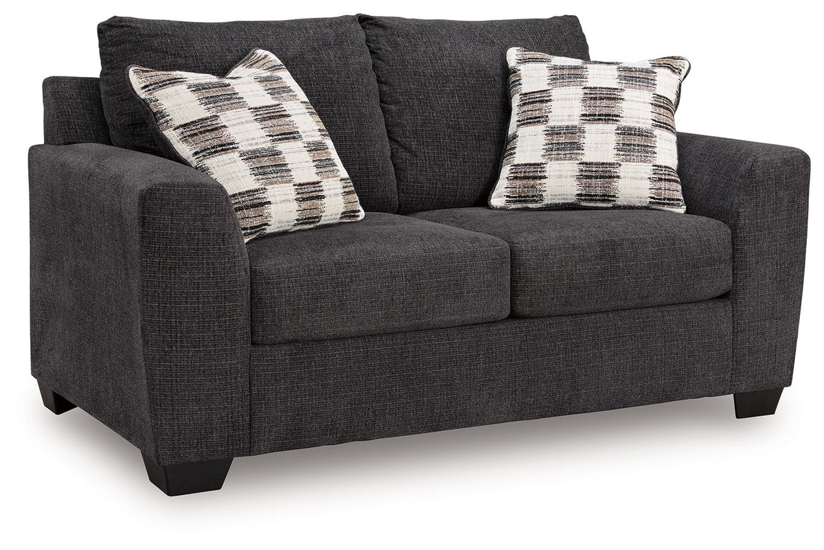 Benchcraft® Loreo stationary loveseat with plush cushions and modern design, perfect for cozy living room seating.