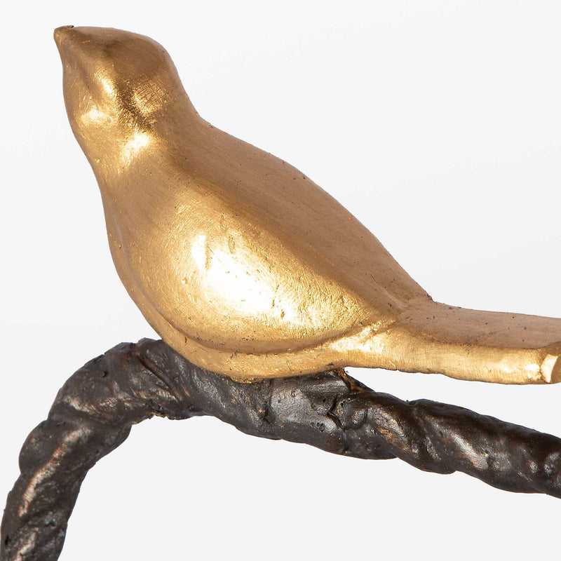 Black and gold birds on a limb sculpture by Uttermost, decorative figurine for home decor.
