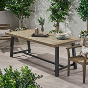 Rustic gray metal outdoor dining table by Noble House, showing a sturdy rectangular table with metal legs and a weathered finish.