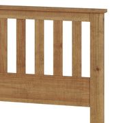 Ridgecrest Home Malinda panel bed with a wooden frame and headboard in a modern bedroom setting.