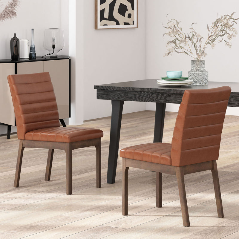 Set of two upholstered Noble House dining chairs with comfortable fabric seats and rubber legs for stable support and modern style.