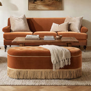 Jennifer Taylor Home Melinda oval tufted bullion fringe storage bench with fabric upholstery and wooden legs.