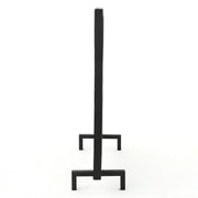 Noble House Thayer single panel iron fireplace screen with geometric design, featuring black metal and decorative cutouts.